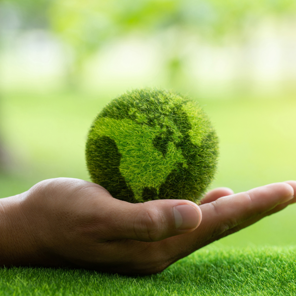 Keg Buddy Sustainability, reusable hand holding green earth