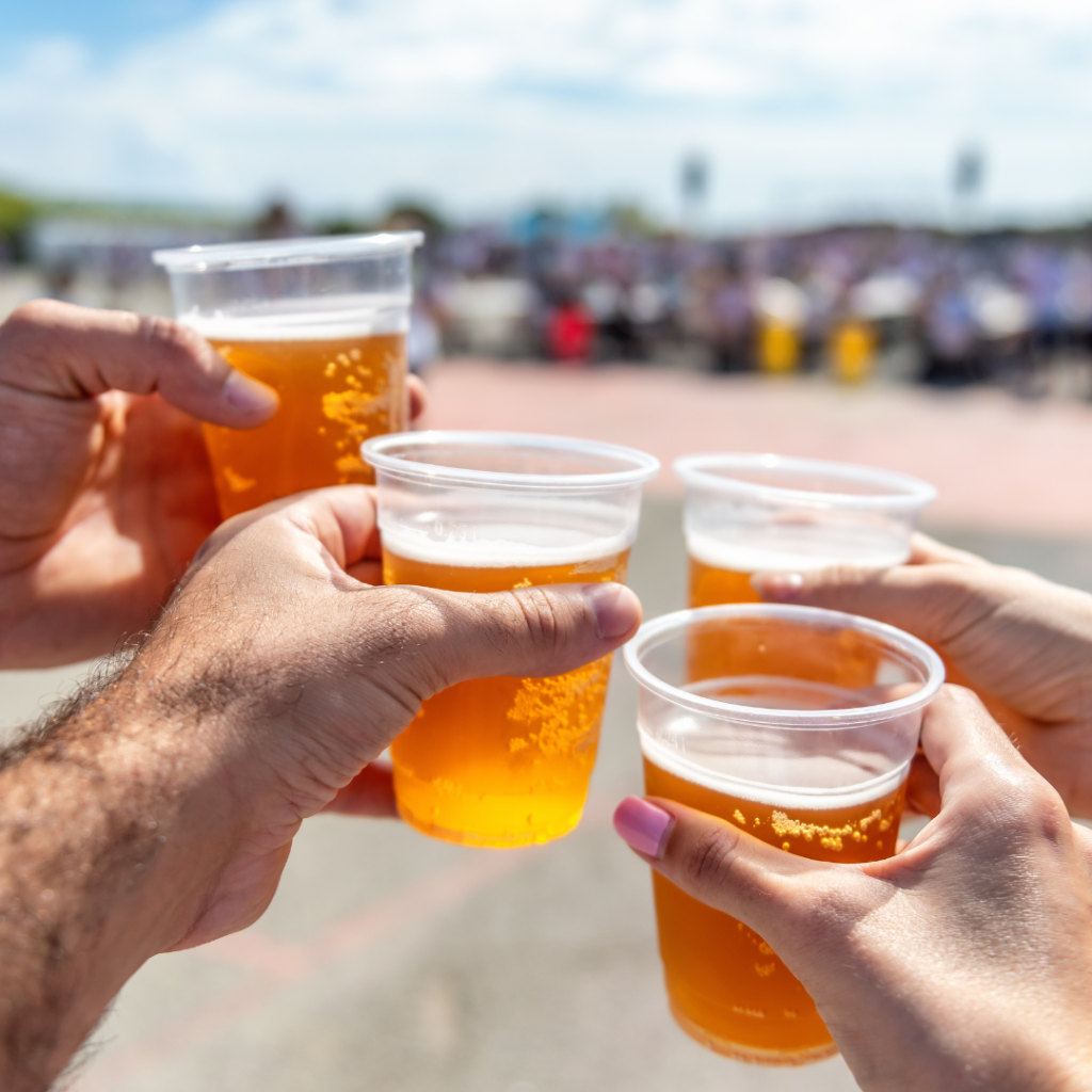 People at event with beer in cups